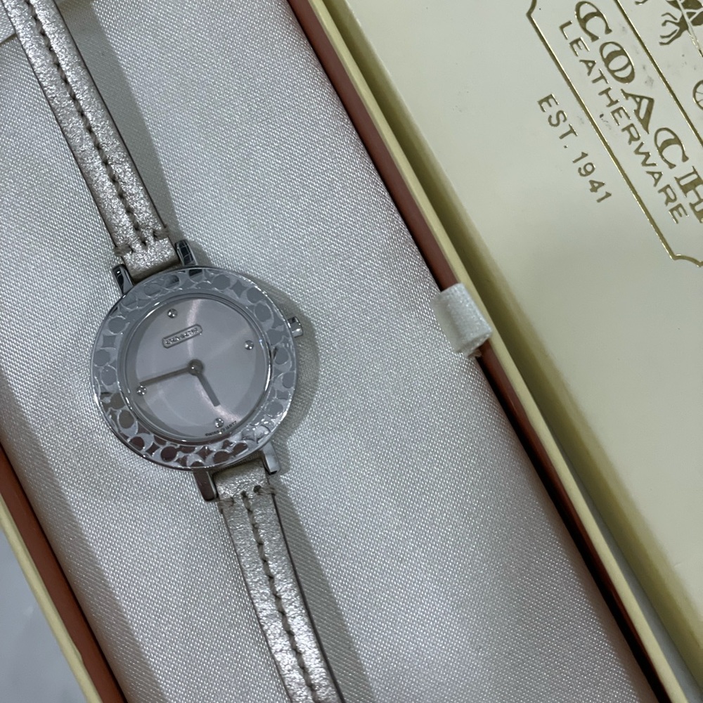 Coach Women’s Gold Leather watch